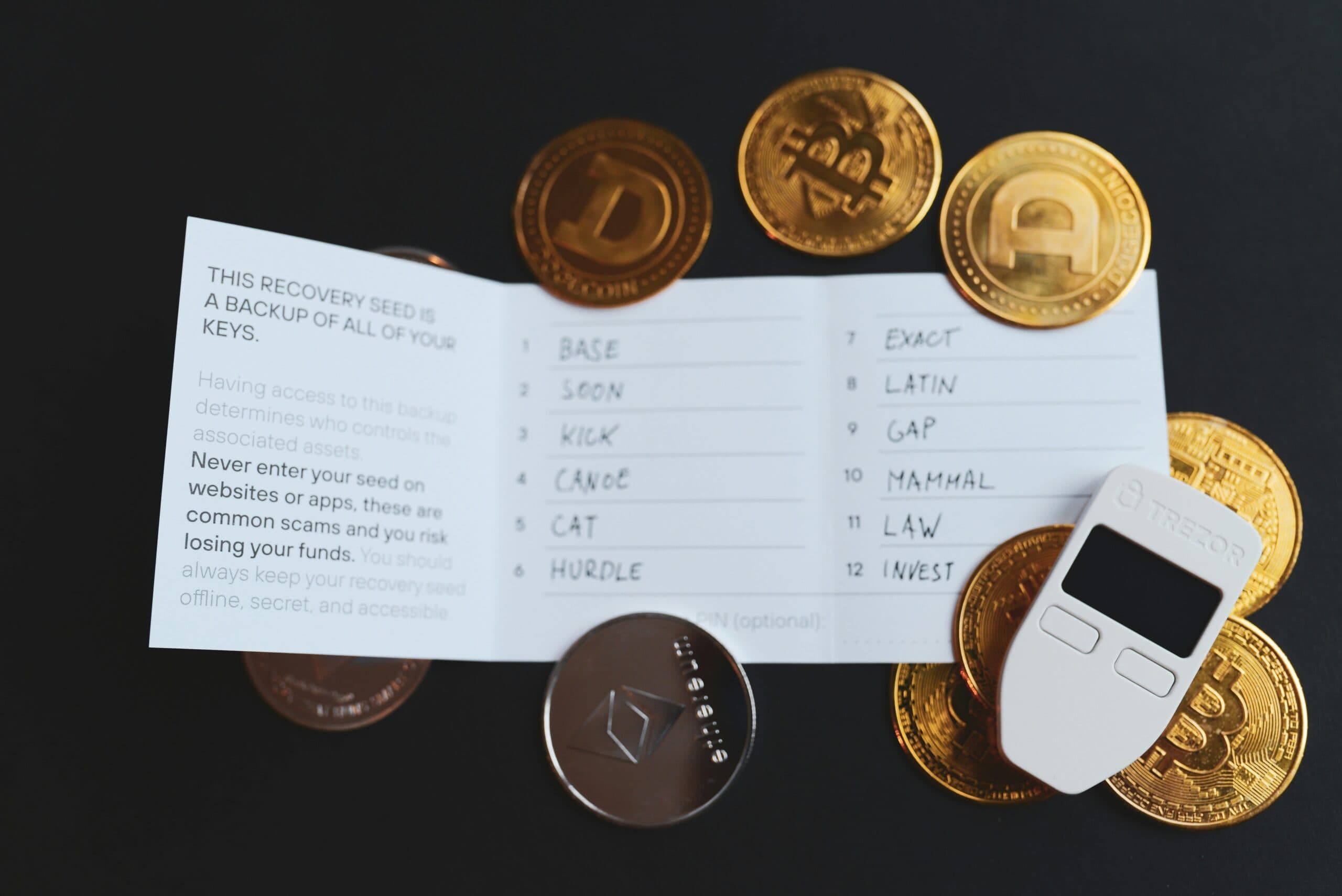 crypto seed phrase after death recovery card with hardware wallet and coins